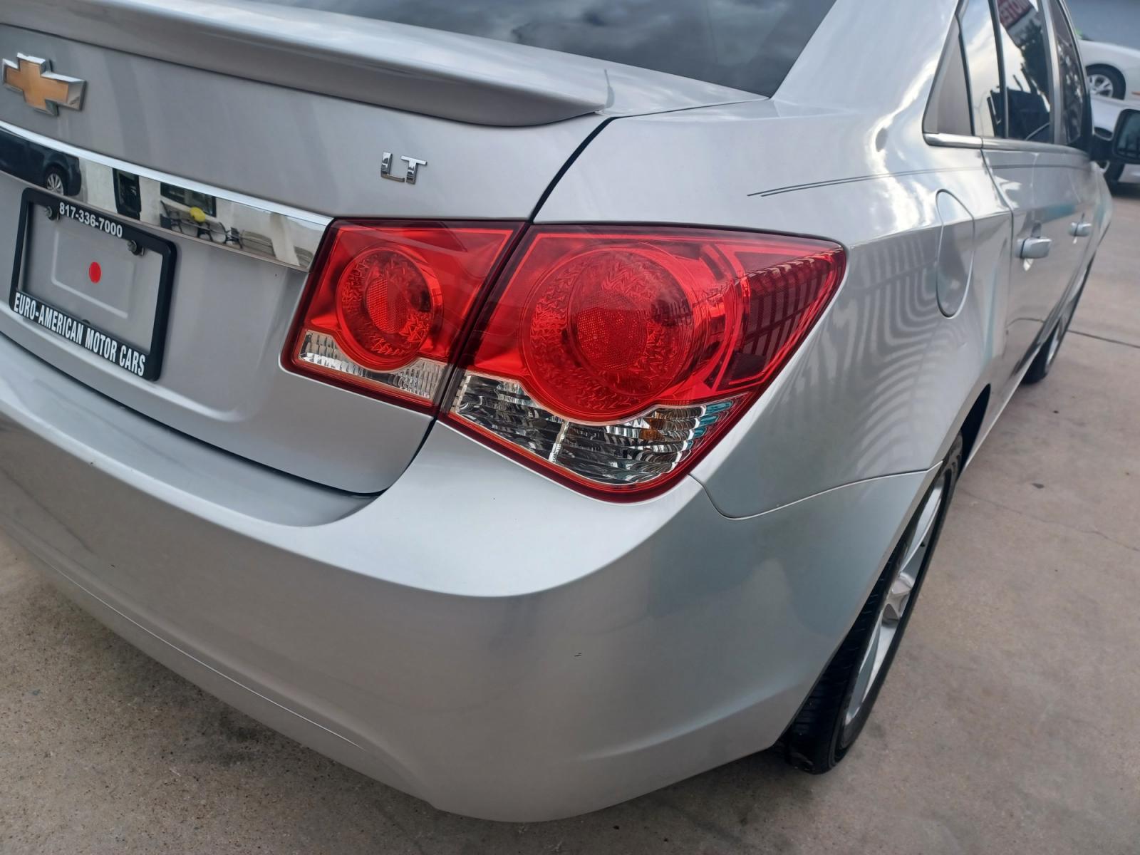 2013 SILVER Chevrolet Cruze 2LT (1G1PE5SB7D7) with an Turbocharged Gas I4 1.4L engine, 6-Speed Automatic transmission, located at 2001 E. Lancaster, Ft. Worth, 76103, (817) 336-7000, 32.746181, -97.301018 - Photo #5